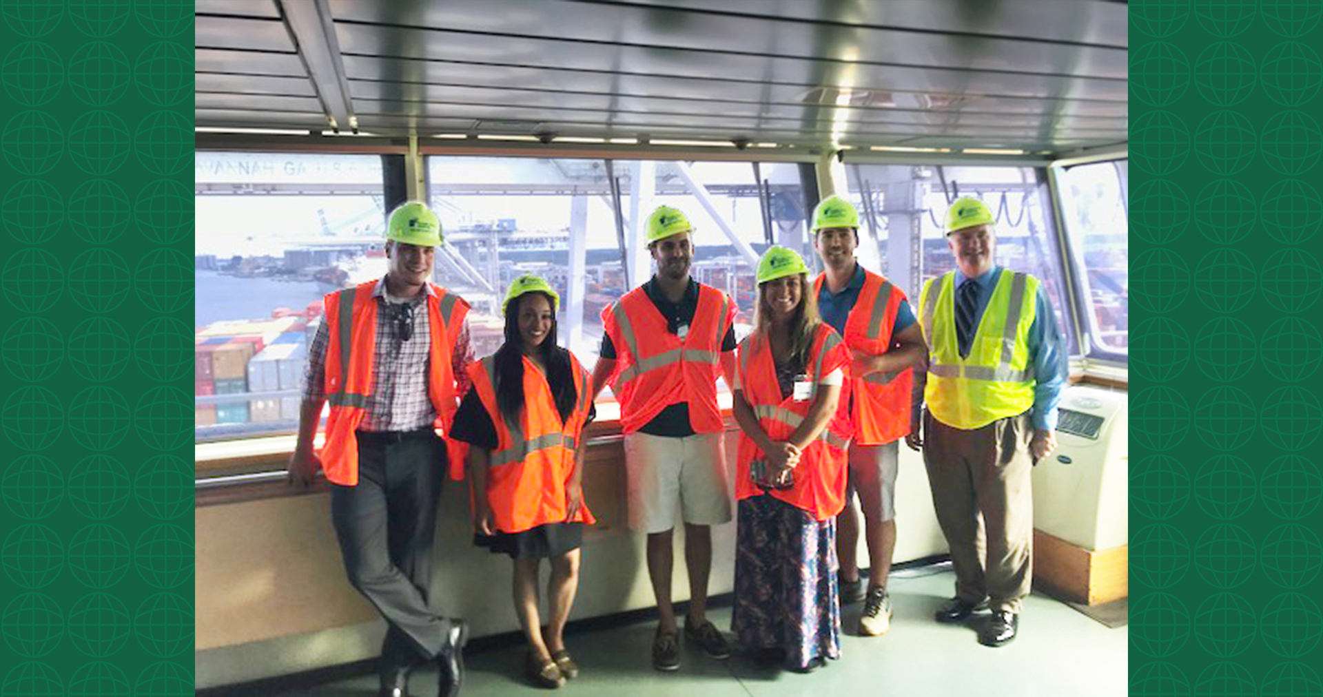 UWL Supply Chain Award winners stand with their tour guides aboard a vessel. From left to right: Celestino "Tino" Nieves, Latesha Mosley, Dave Pycraft (UWL Savannah Tour Guide), Adrienne Parrish, Johnny Maiden, Bill Barrs (Regional Sales Manager, Georgia Ports Authority)